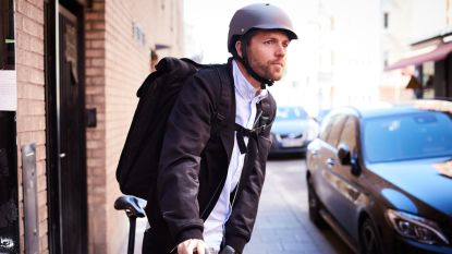 Image shows a person wearing one of the best commuter cycling jackets